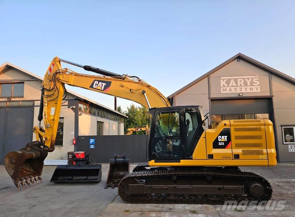CAT 323 Гусеничні екскаватори