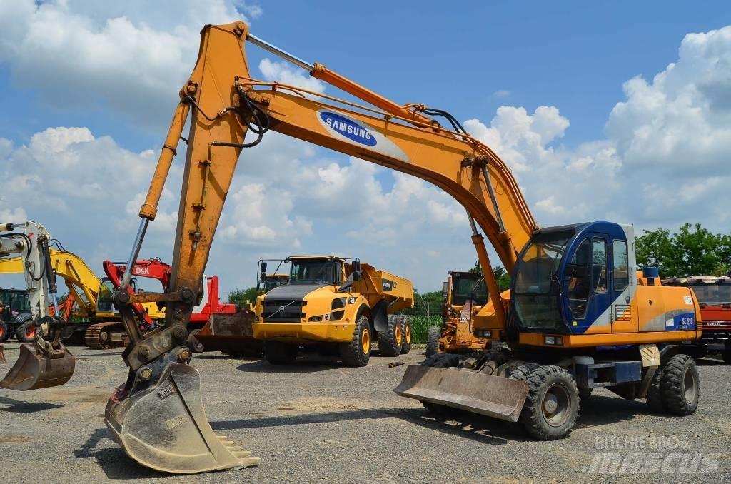 Samsung SE 210 W-2 Колісні екскаватори