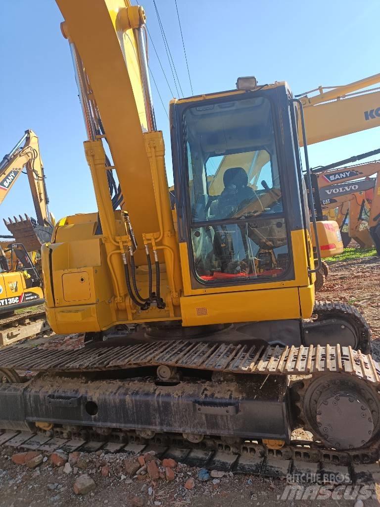 Komatsu PC 138US Середні екскаватори 7т. - 12т.