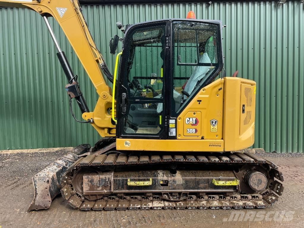 CAT 308 CR Середні екскаватори 7т. - 12т.