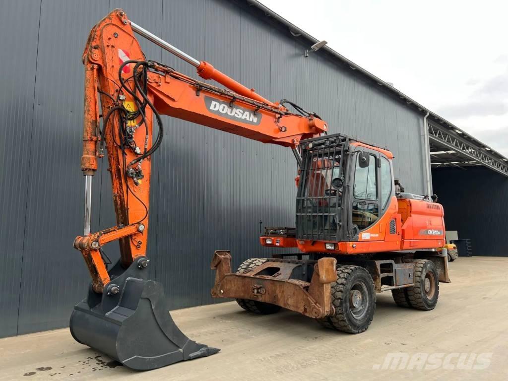 Doosan DX210W Колісні екскаватори