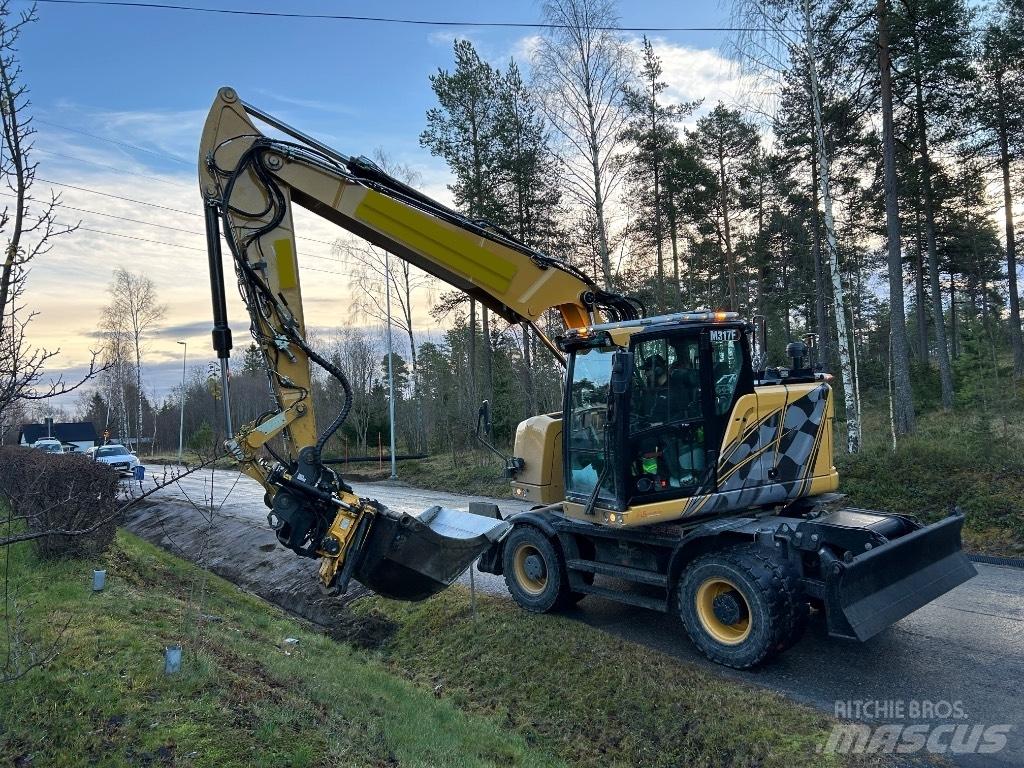CAT M 317F Колісні екскаватори