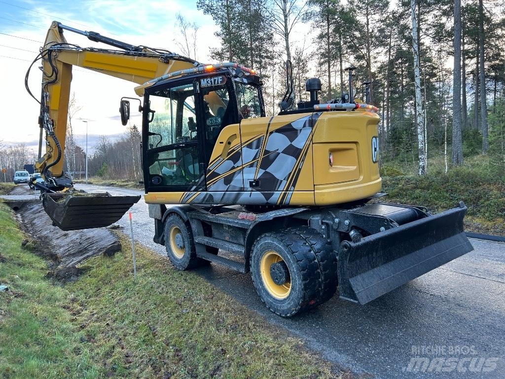 CAT M 317F Колісні екскаватори