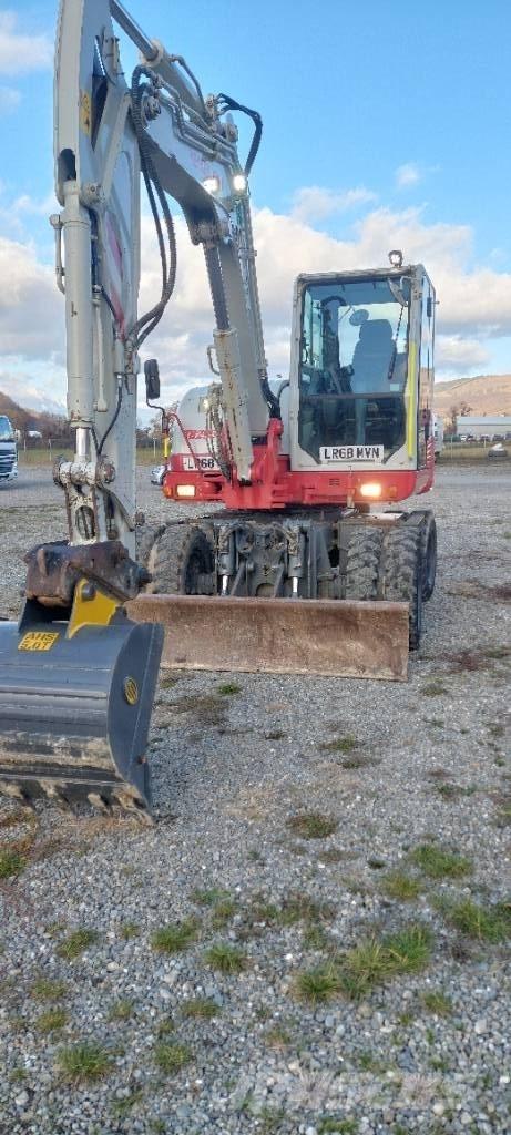 Takeuchi TB 295 W Колісні екскаватори