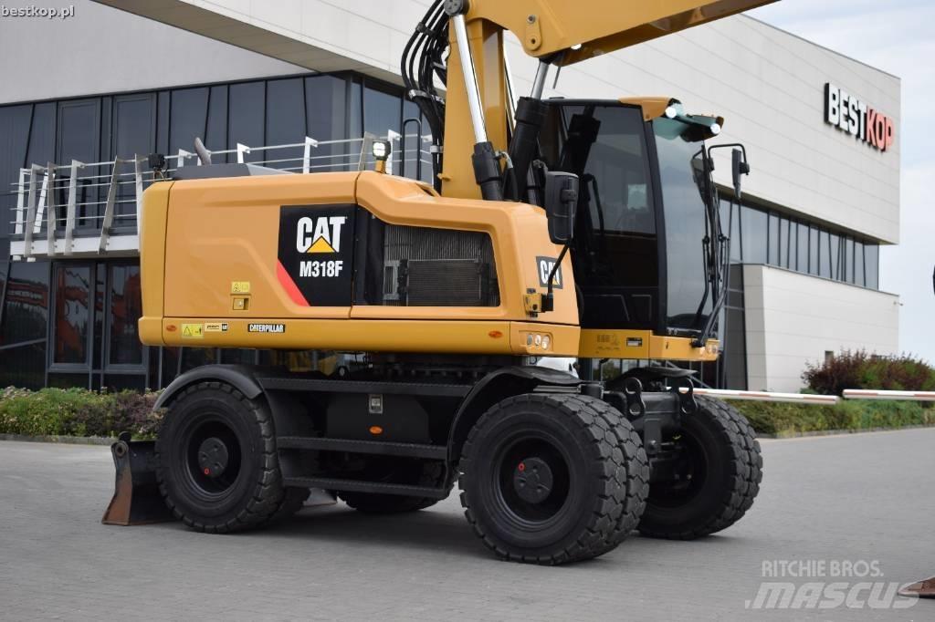 CAT M 318 F Колісні екскаватори