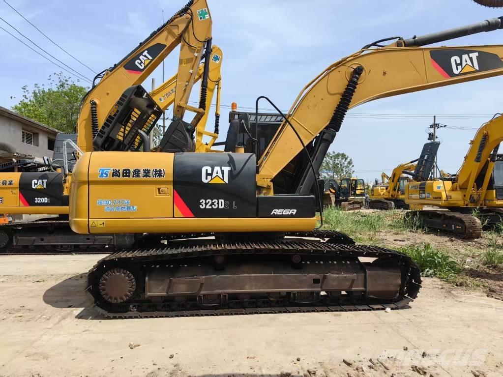 CAT 323 D Гусеничні екскаватори