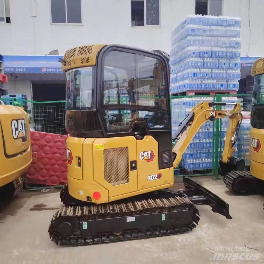 CAT 302 Міні-екскаватори < 7т