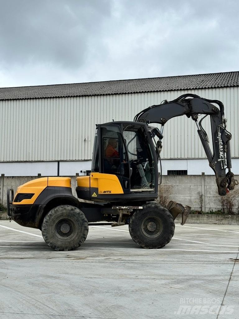 Mecalac 12 MTX Колісні екскаватори