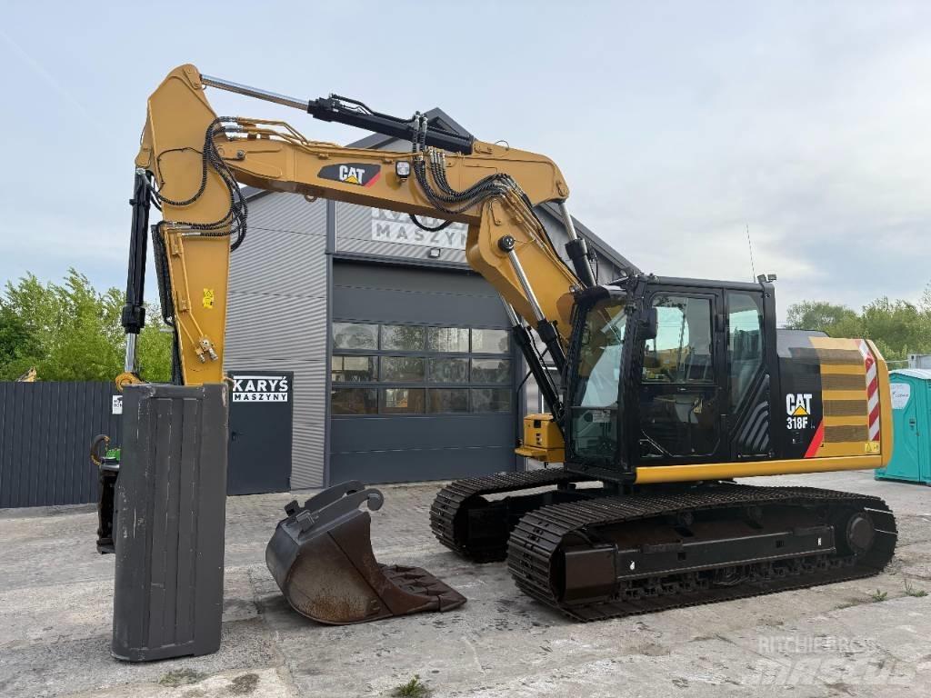 CAT 318 Гусеничні екскаватори