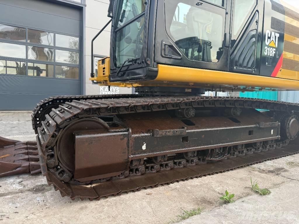 CAT 318 Гусеничні екскаватори