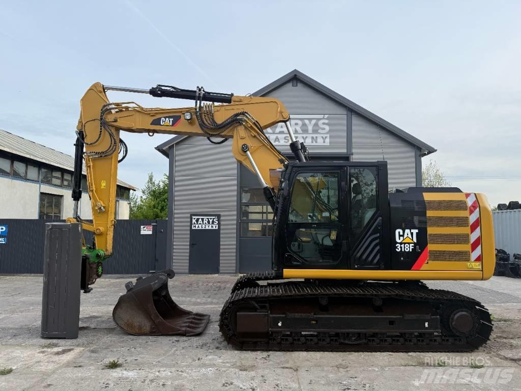 CAT 318 Гусеничні екскаватори