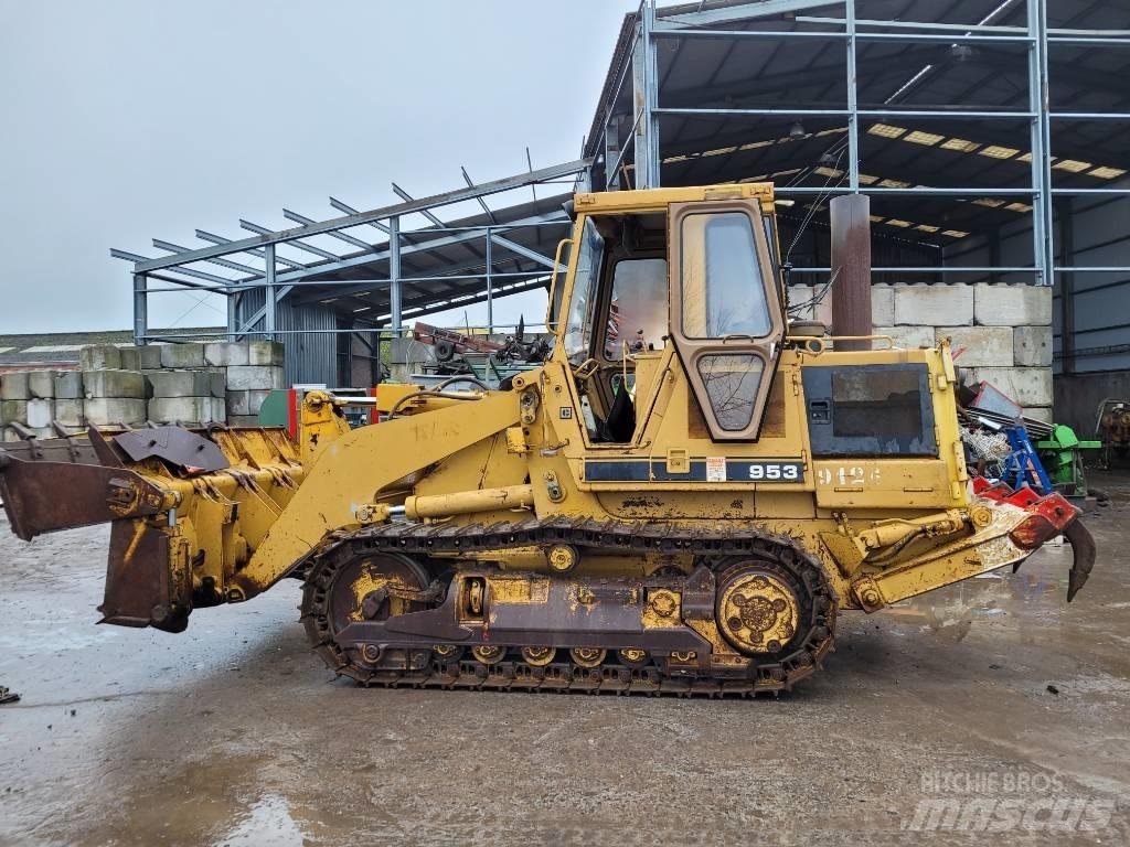 CAT 953 Гусеничні вантажники