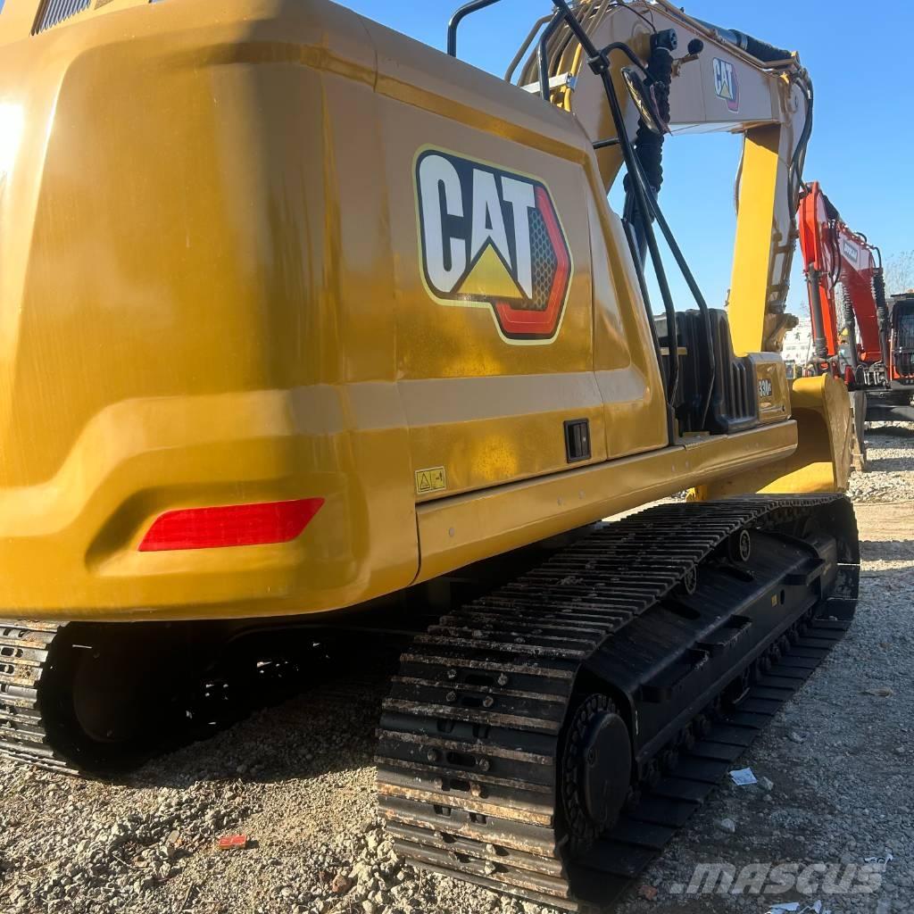 CAT 330 Гусеничні екскаватори