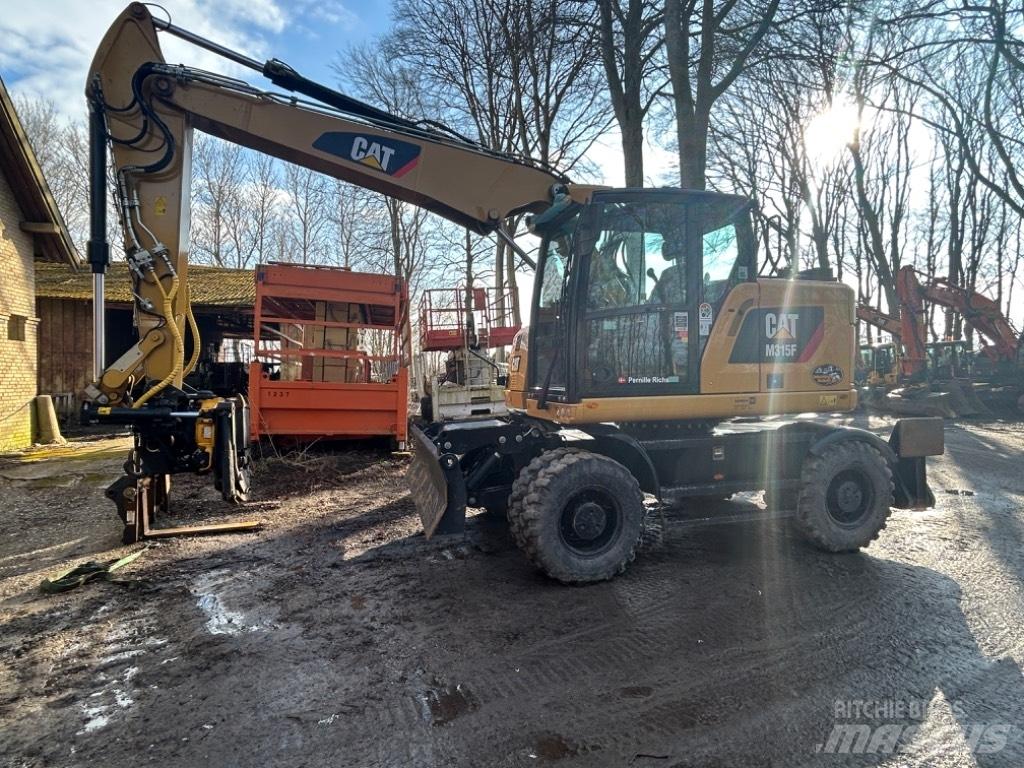 CAT M315 Колісні екскаватори
