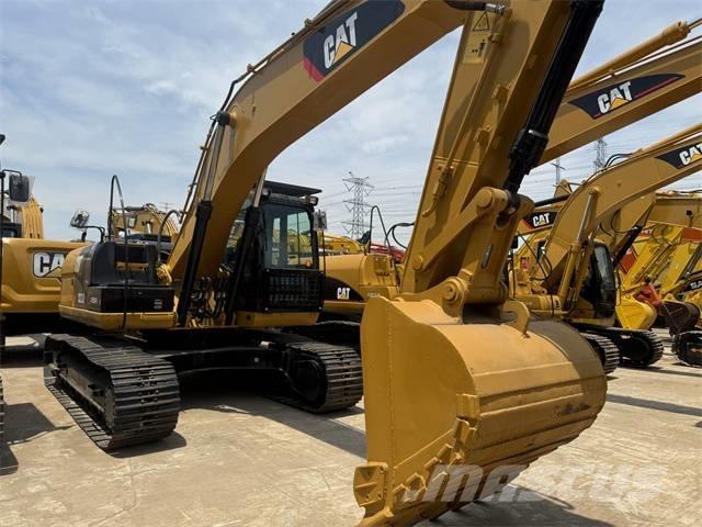 CAT 323 D L Гусеничні екскаватори