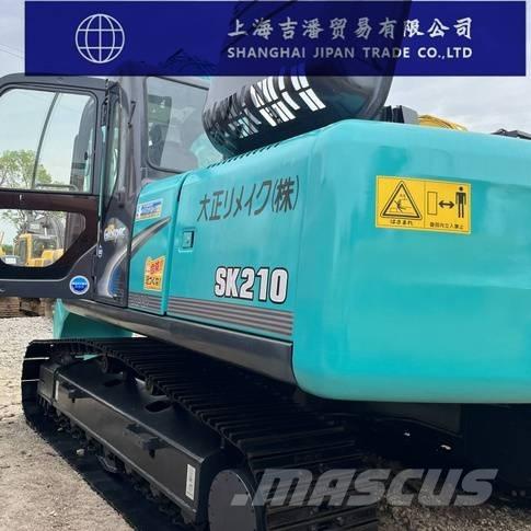 Kobelco SK 210 Гусеничні екскаватори