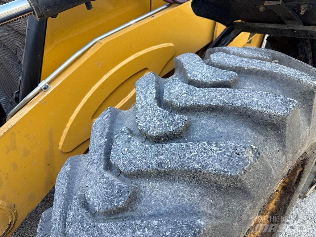 CAT 444 E Екскаватори-навантажувачі