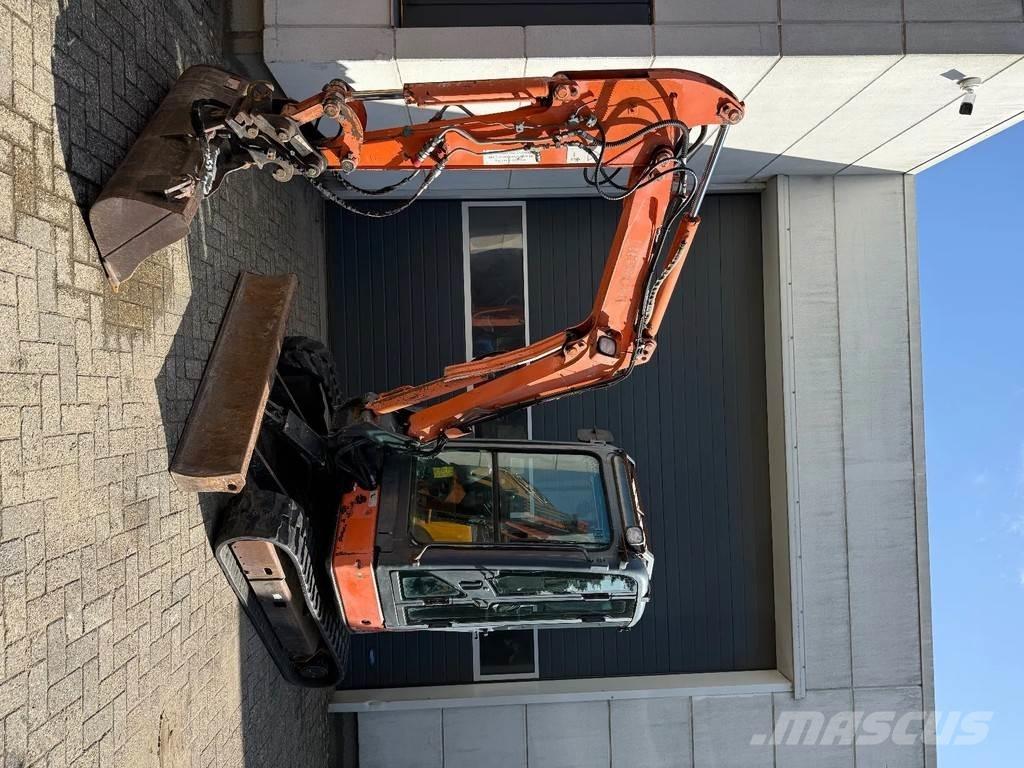 Hitachi ZX30U Міні-екскаватори < 7т