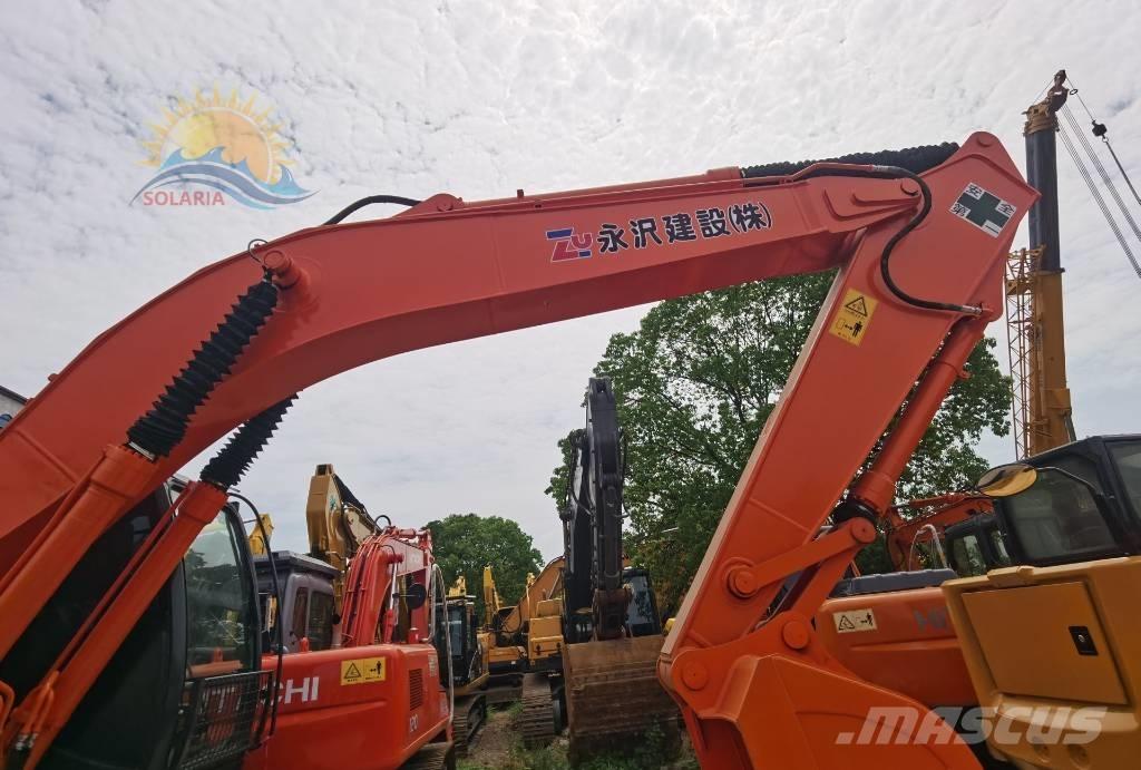 Hitachi ZX 200 Гусеничні екскаватори