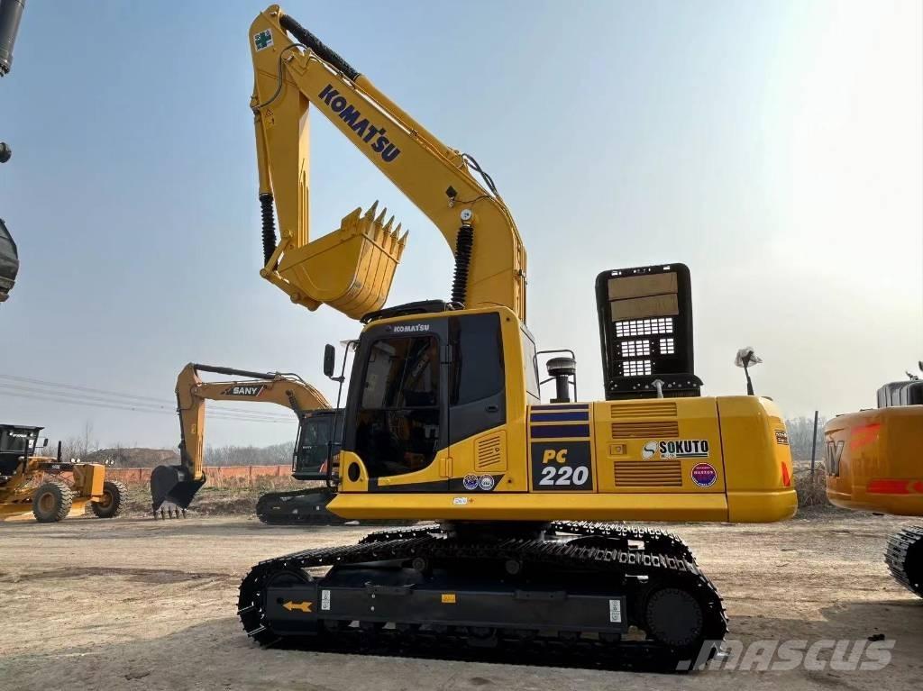 Komatsu 220 Гусеничні екскаватори