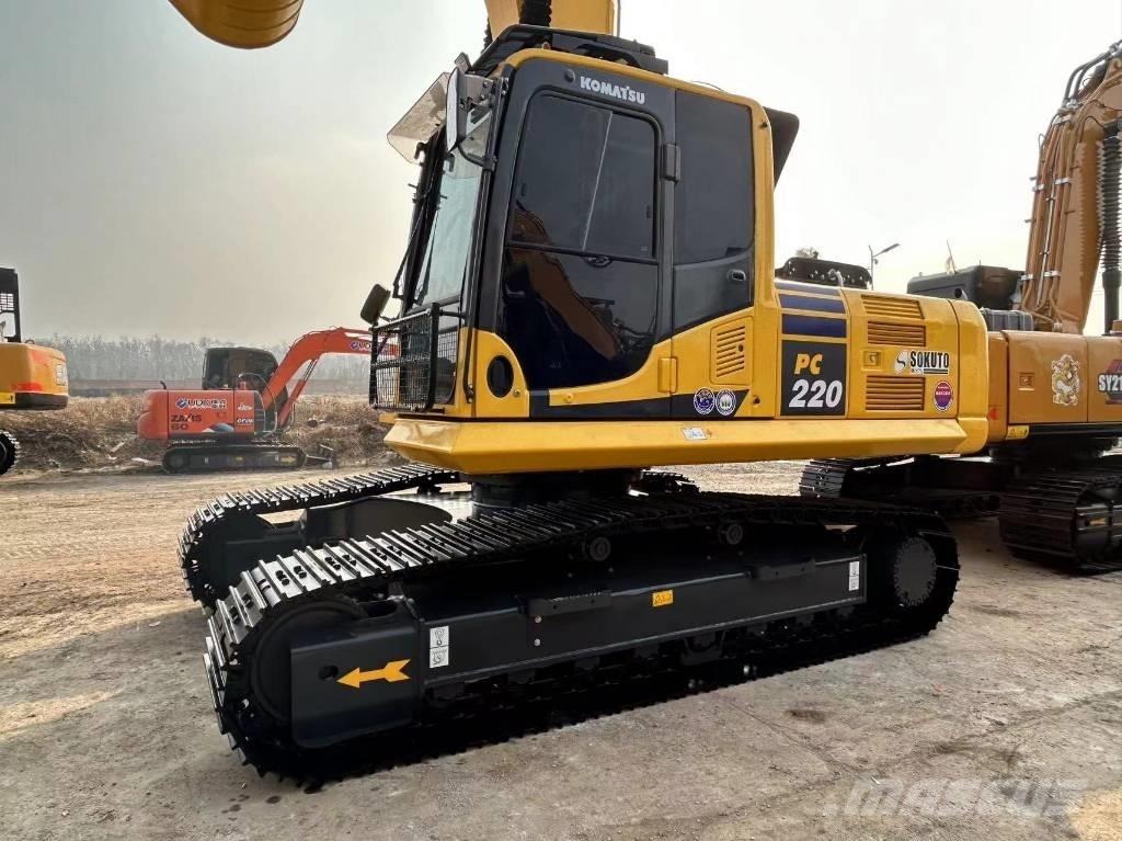 Komatsu 220 Гусеничні екскаватори