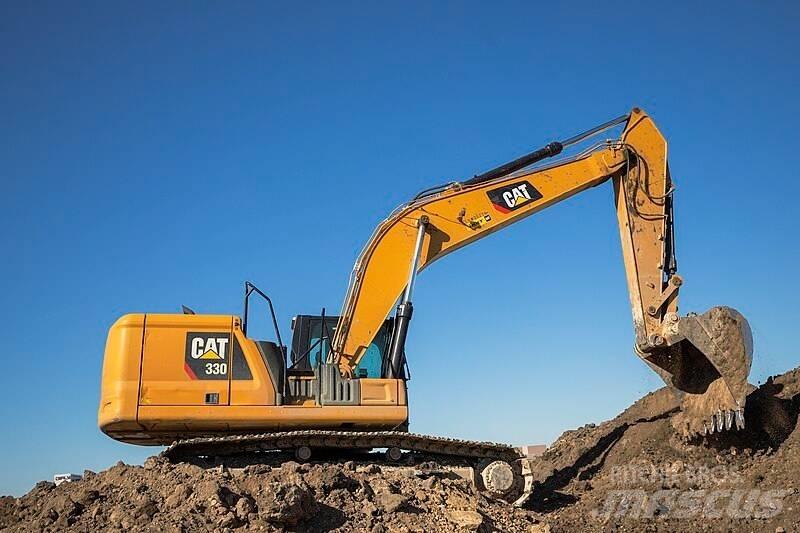 CAT 330 Середні екскаватори 7т. - 12т.
