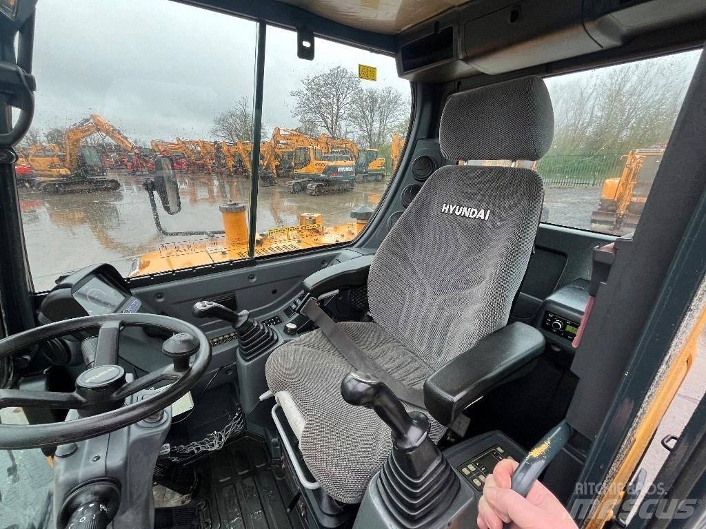 Hyundai R55W-9A Колісні екскаватори
