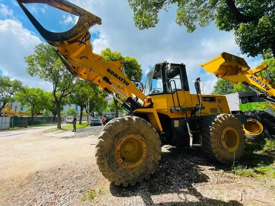 Komatsu WA320 Фронтальні навантажувачі