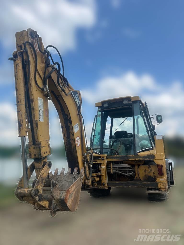 CAT 428 Екскаватори-навантажувачі