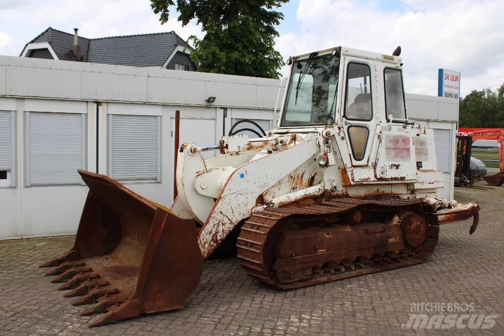 CAT 953 Гусеничні вантажники