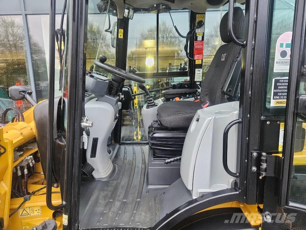 CAT 908m Фронтальні навантажувачі