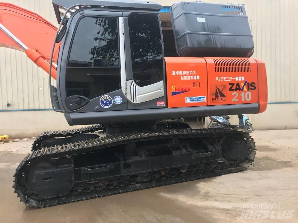 Hitachi ZX 210 Гусеничні екскаватори