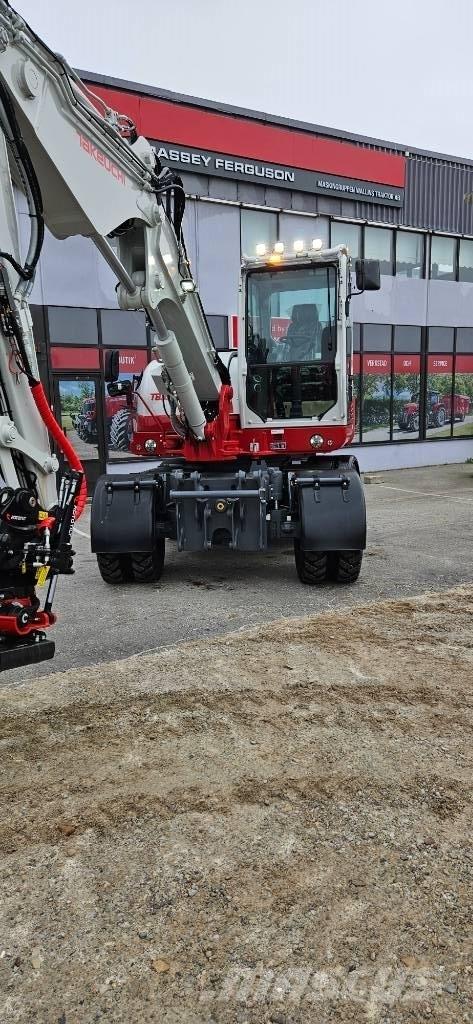 Takeuchi TB 395 W Колісні екскаватори