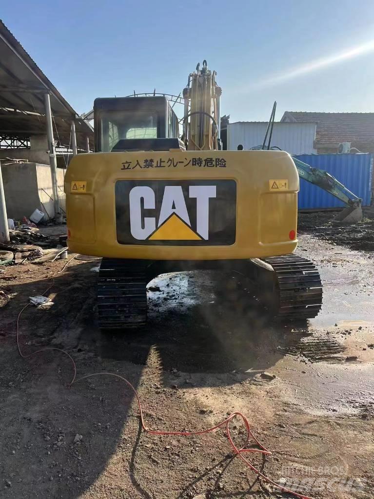 CAT 312d Гусеничні екскаватори