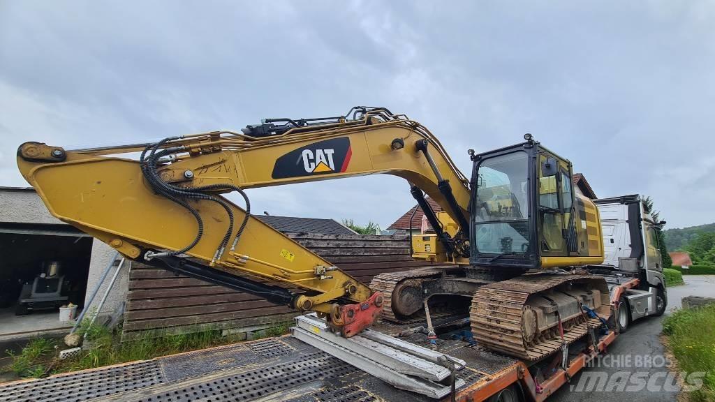CAT 318 FL Гусеничні екскаватори