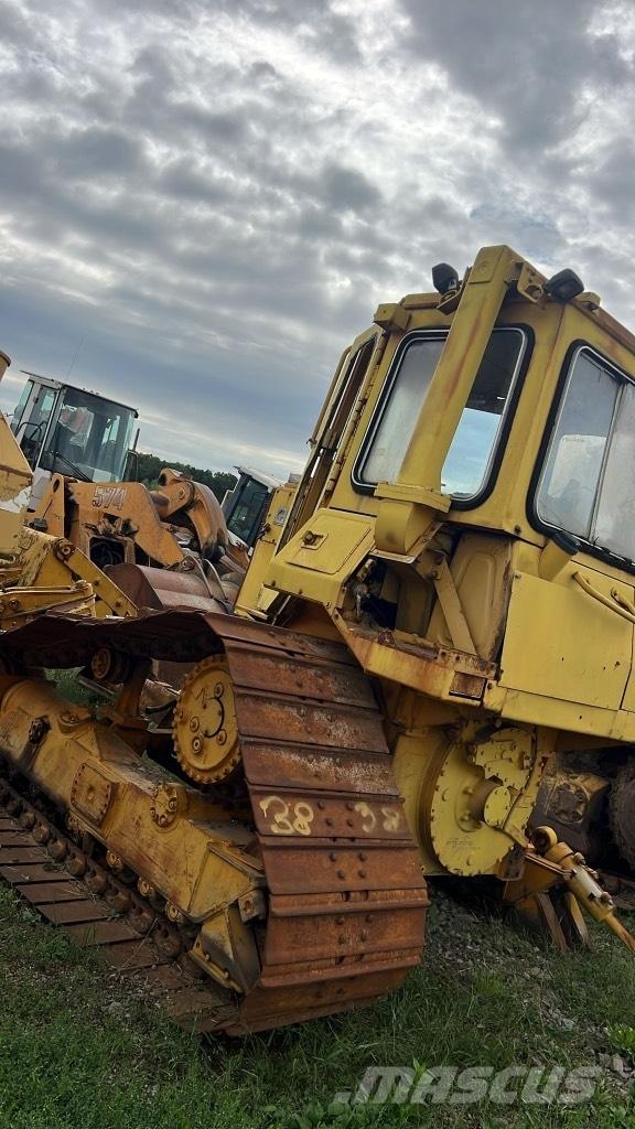 CAT D 4 H Бони і ковші