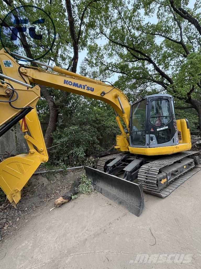 Komatsu 128 Гусеничні екскаватори