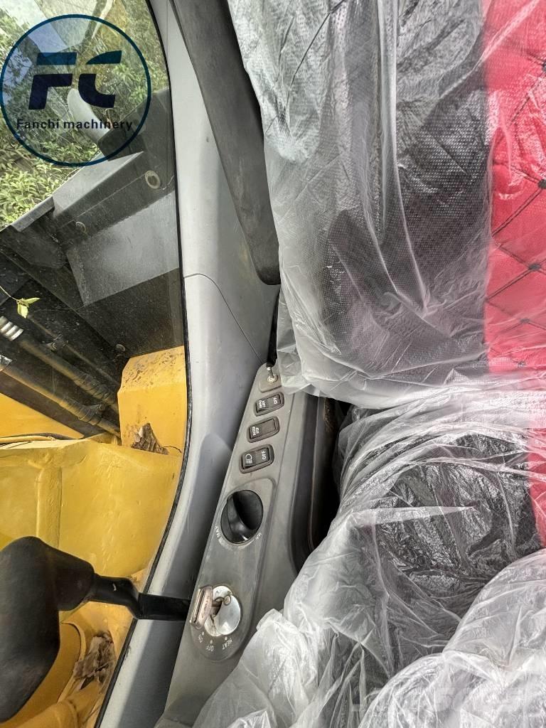 Komatsu 128 Гусеничні екскаватори