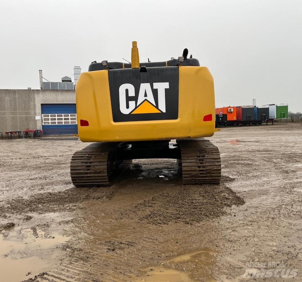 CAT 323 F L Гусеничні екскаватори