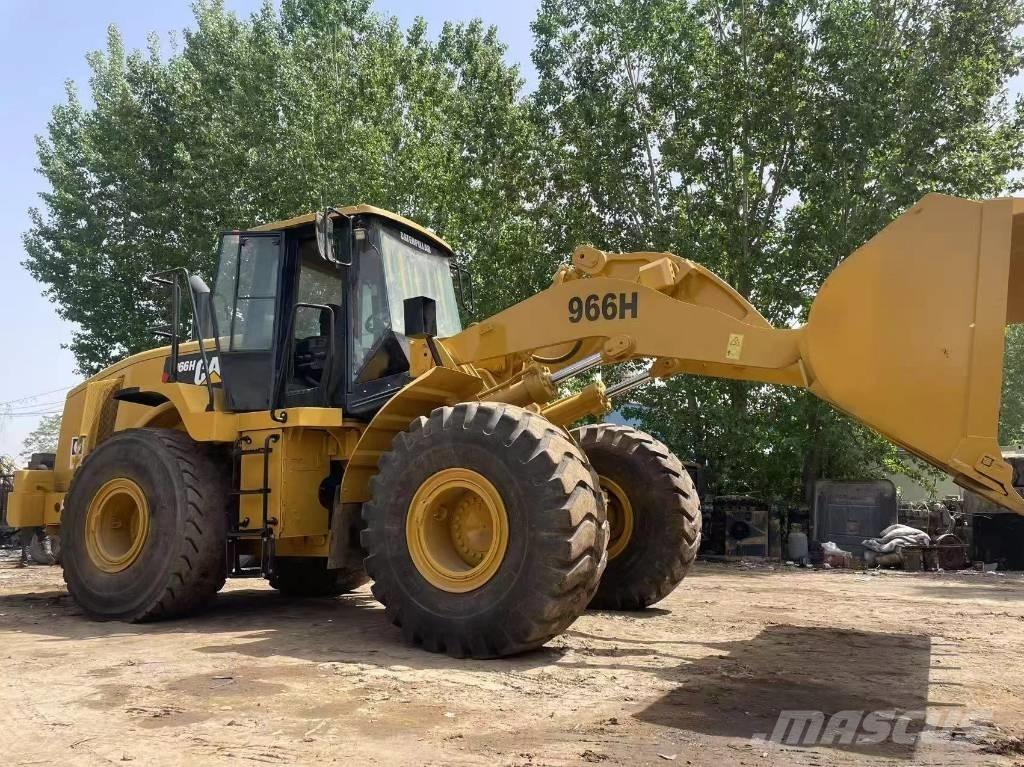 CAT 966 Колісні екскаватори