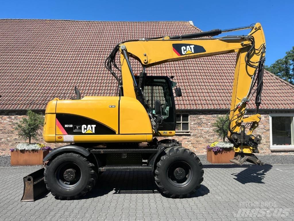 CAT M 313 D Колісні екскаватори