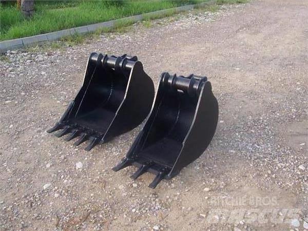 CAT 428 Колісні екскаватори