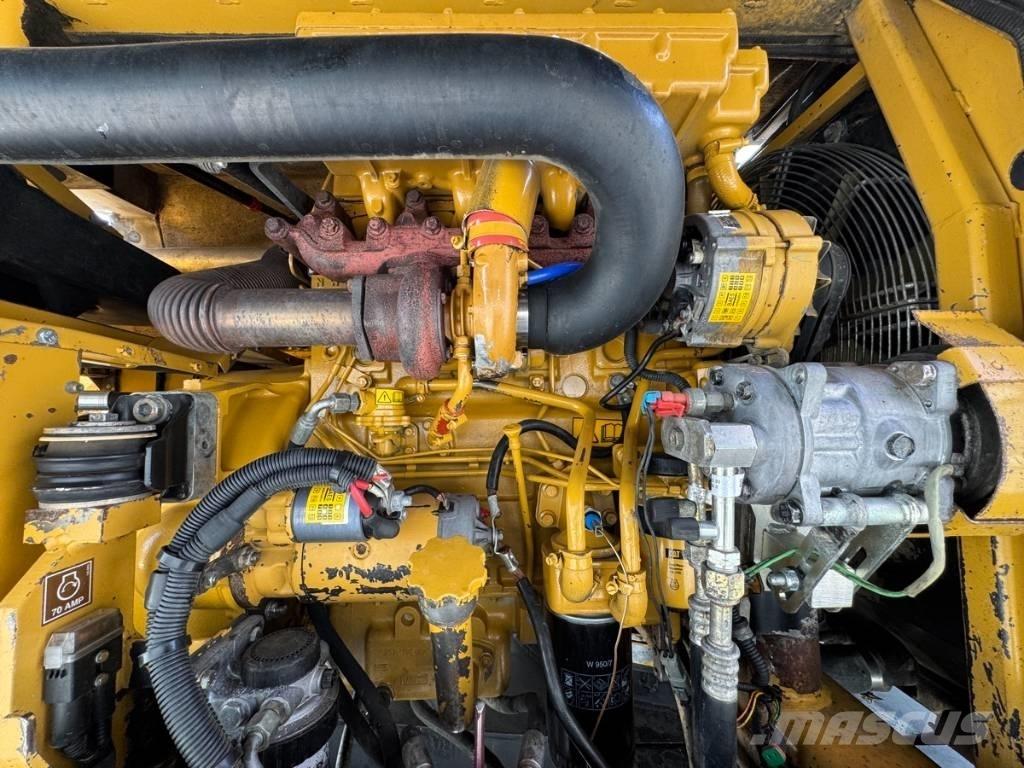 CAT M 315 Колісні екскаватори