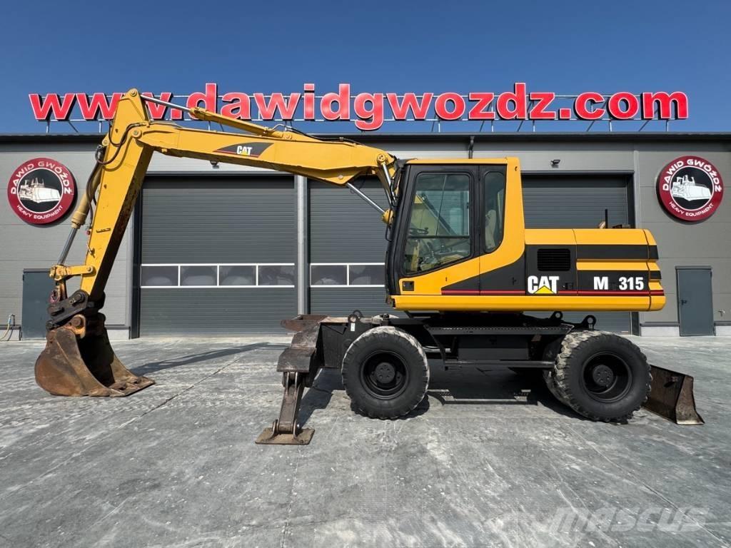 CAT M 315 Колісні екскаватори