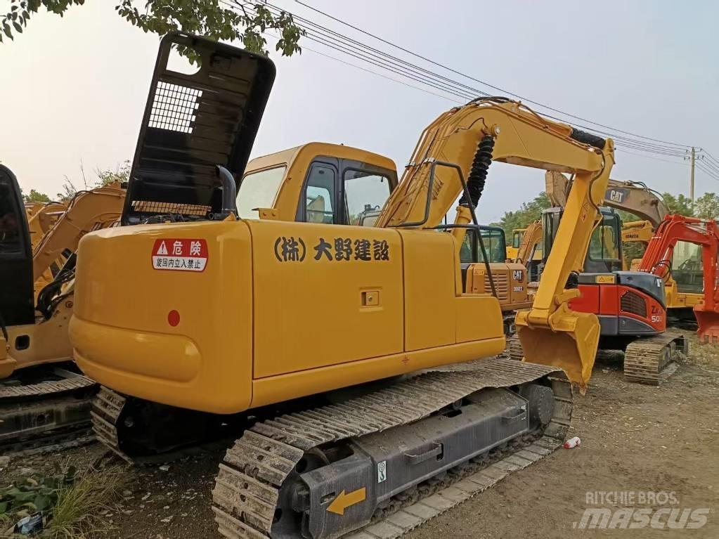 Komatsu PC120 Середні екскаватори 7т. - 12т.