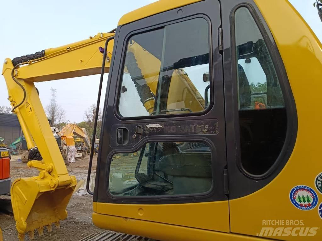 Komatsu PC120 Середні екскаватори 7т. - 12т.
