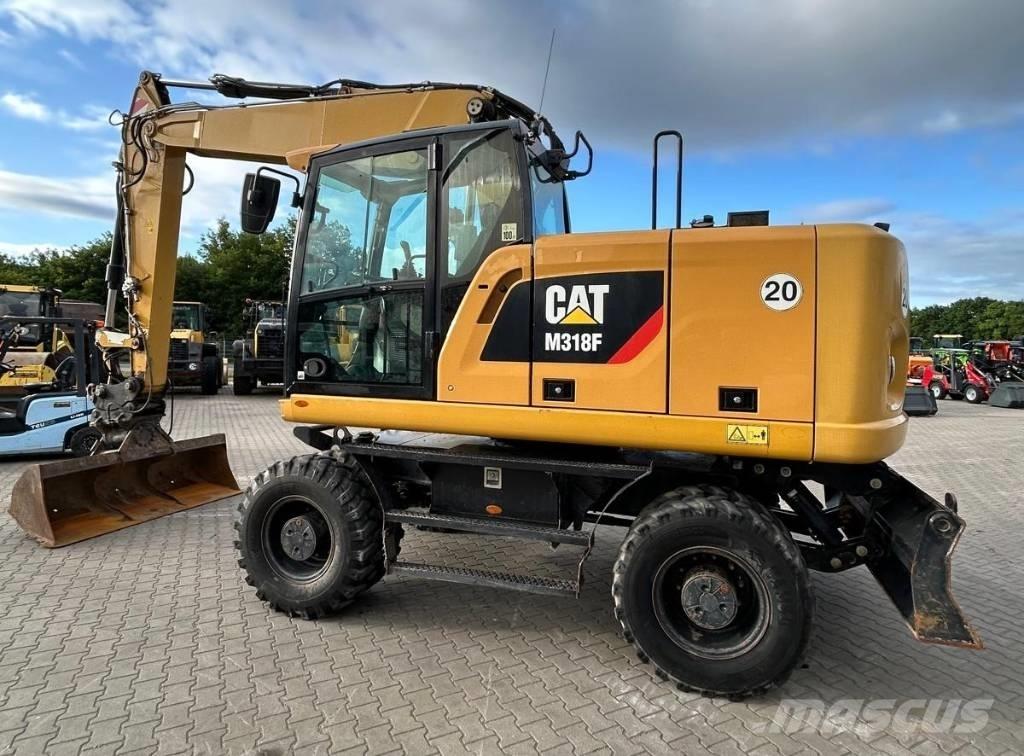 CAT M 318 F Колісні екскаватори