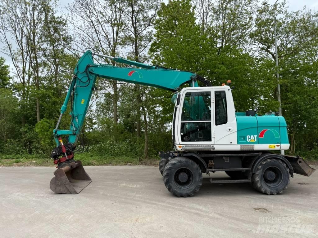 CAT M 313 D Колісні екскаватори