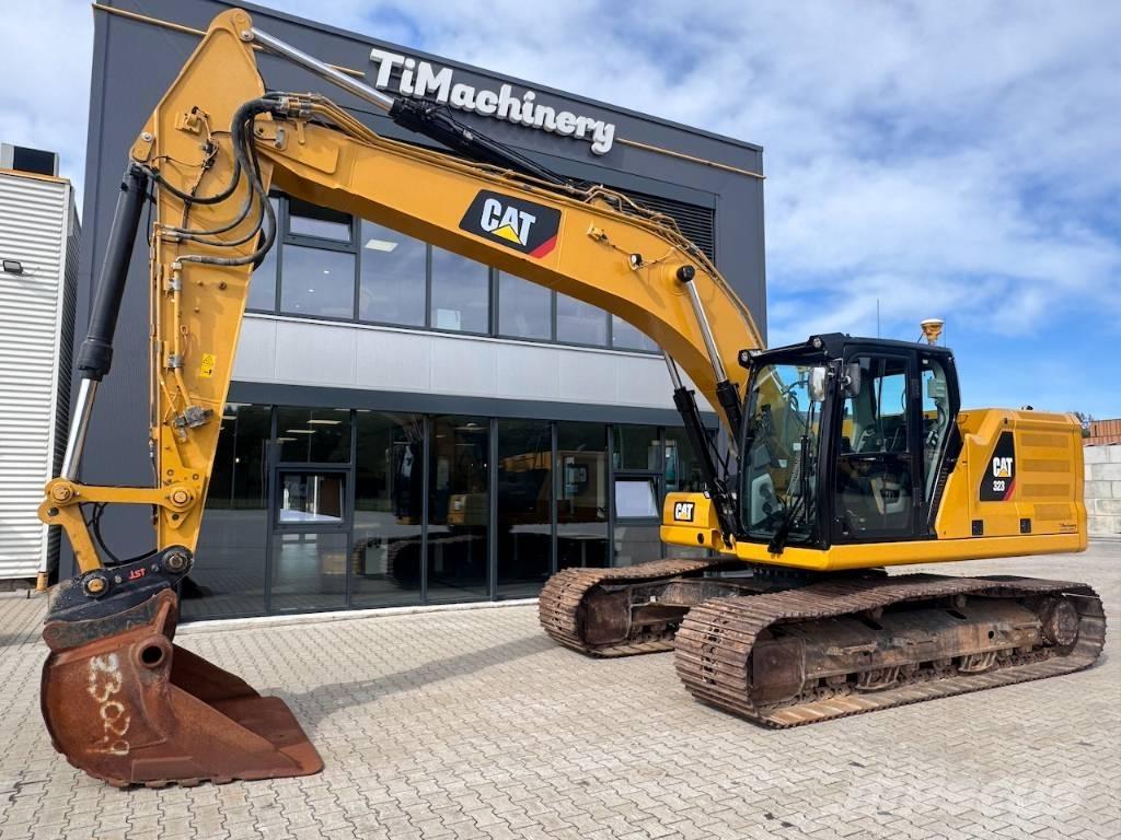 CAT 323 Гусеничні екскаватори