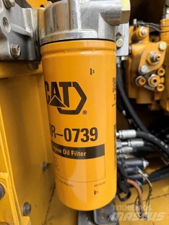CAT 323DL (320DL) Гусеничні екскаватори
